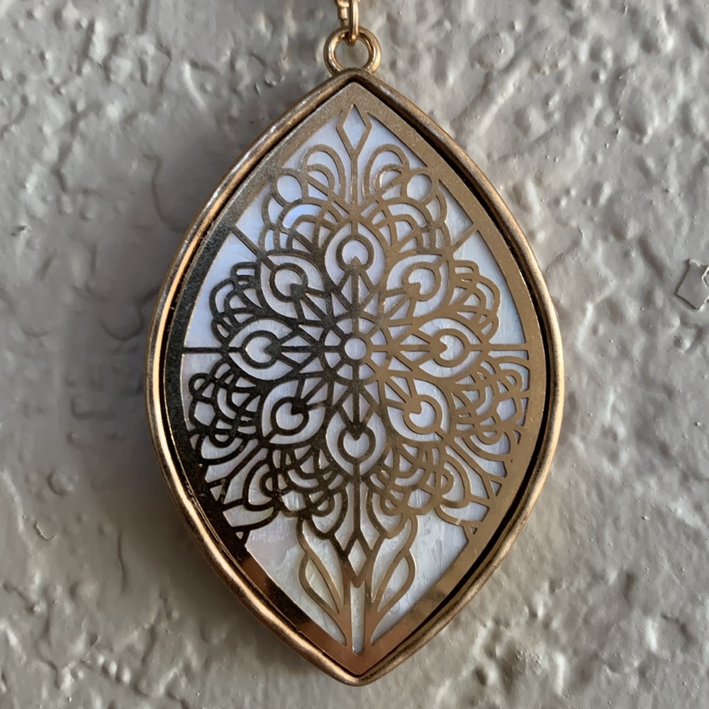 Torrid rose gold colored pendant